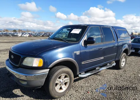 2002 Ford F-150 Lariat/Xlt z USA, uszkodzony, nr VIN 1FTRW08L32KC55365
